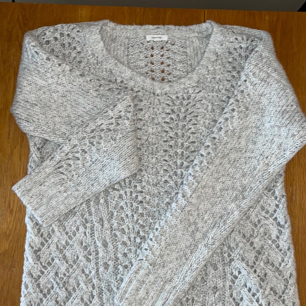 Maurice’s knitted sweater.